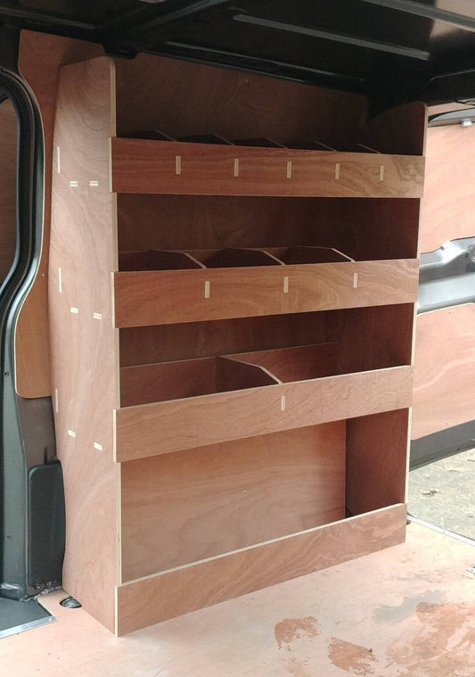 CNC Design plywood van racking and shelving installed in a Peugeot Expert MWB (2016) commercial vehicle for organized storage.