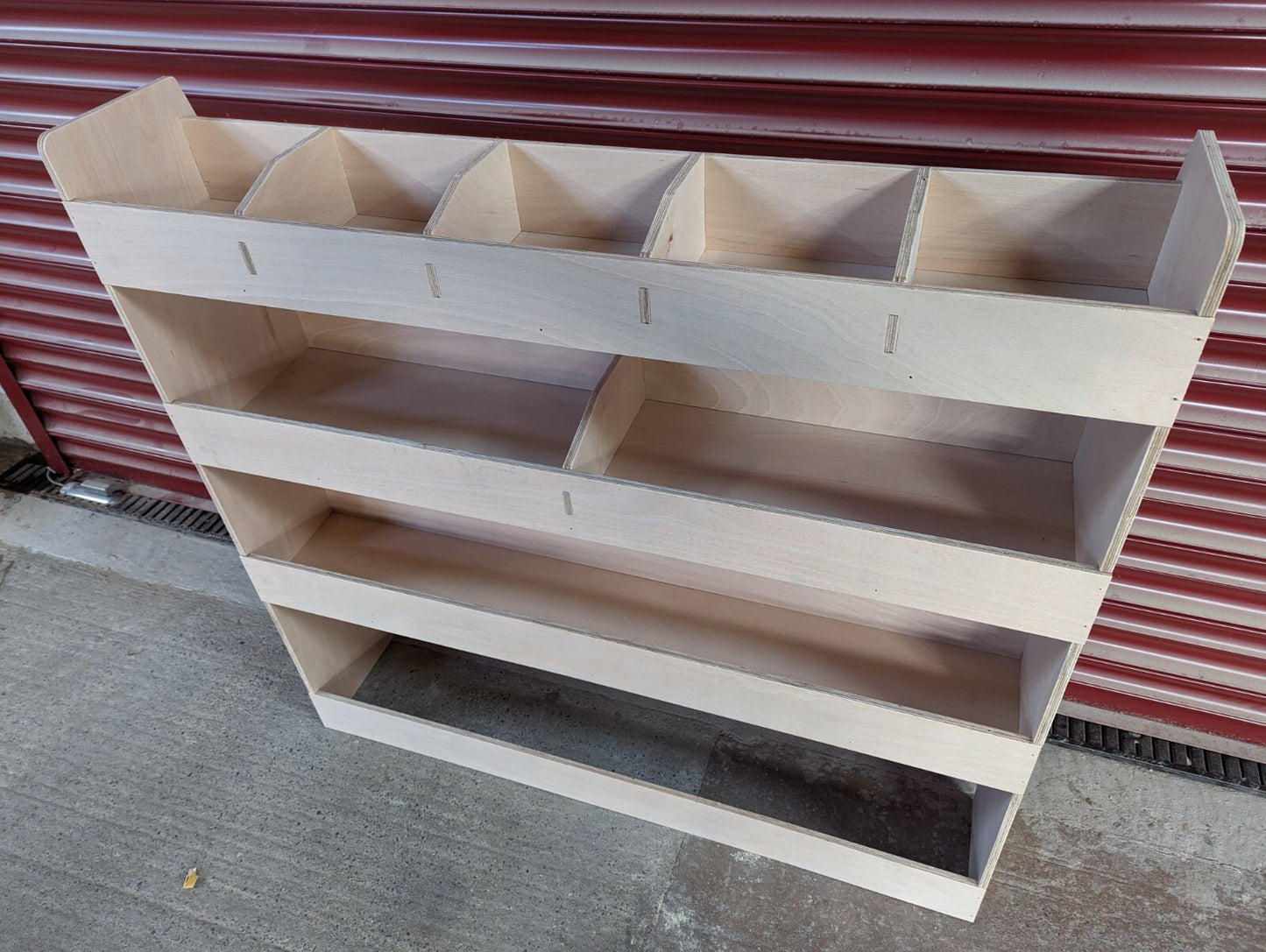 RS Ford Transit Connect Van racking and storage shelving on the driver’s side for 2014 model, designed for commercial vehicle organization.