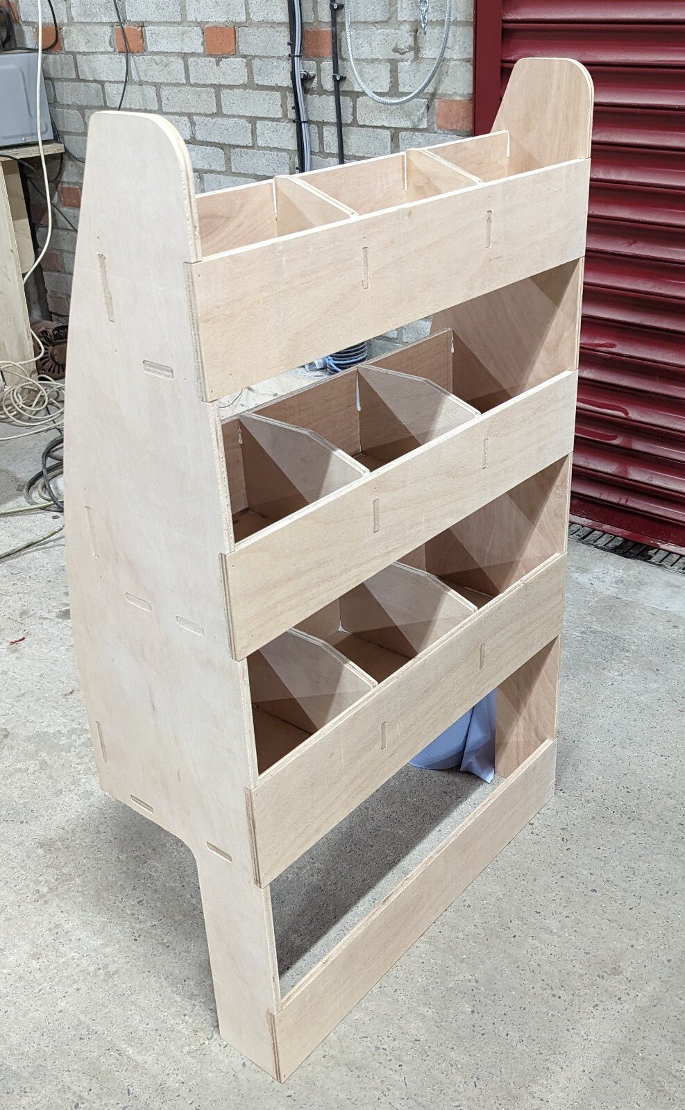 RS VW Caddy SWB Van racking and shelving for tool storage, shown on off side and near side of the vehicle.