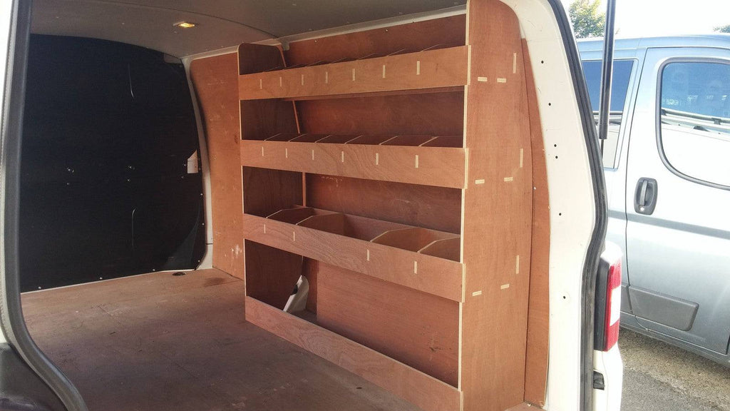 VW T5 Transporter LWB van racking system with plywood shelves for storage and organization of tools and equipment.