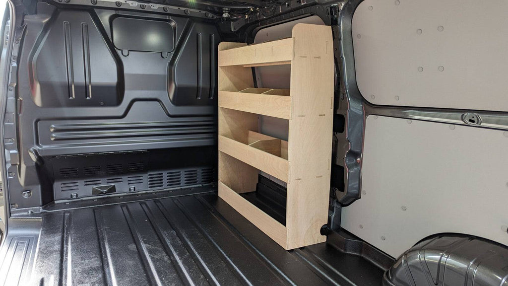 Ford Transit Custom 2024 SWB van rack interior setup showing organized storage and shelving for commercial vehicle use.