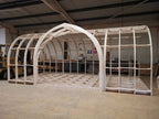 Shropshire CNC XL centre door pod frame kit for modular buildings, 10m by 4m, with metal frame components and central door opening.