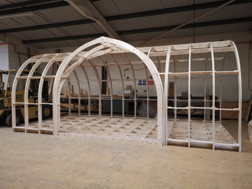 Shropshire CNC XL centre door pod frame kit for modular buildings, 10m by 4m, with metal frame components and central door opening.