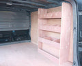 Vauxhall Vivaro SWB van racking with plywood shelving installed inside for organized cargo storage, 2014-2018 model.