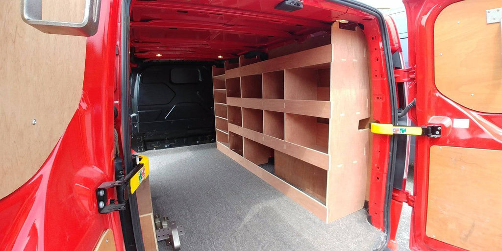 Ford Custom van racking with plywood shelving and deep storage, including drill and service case in LWB van for commercial vehicle organization.