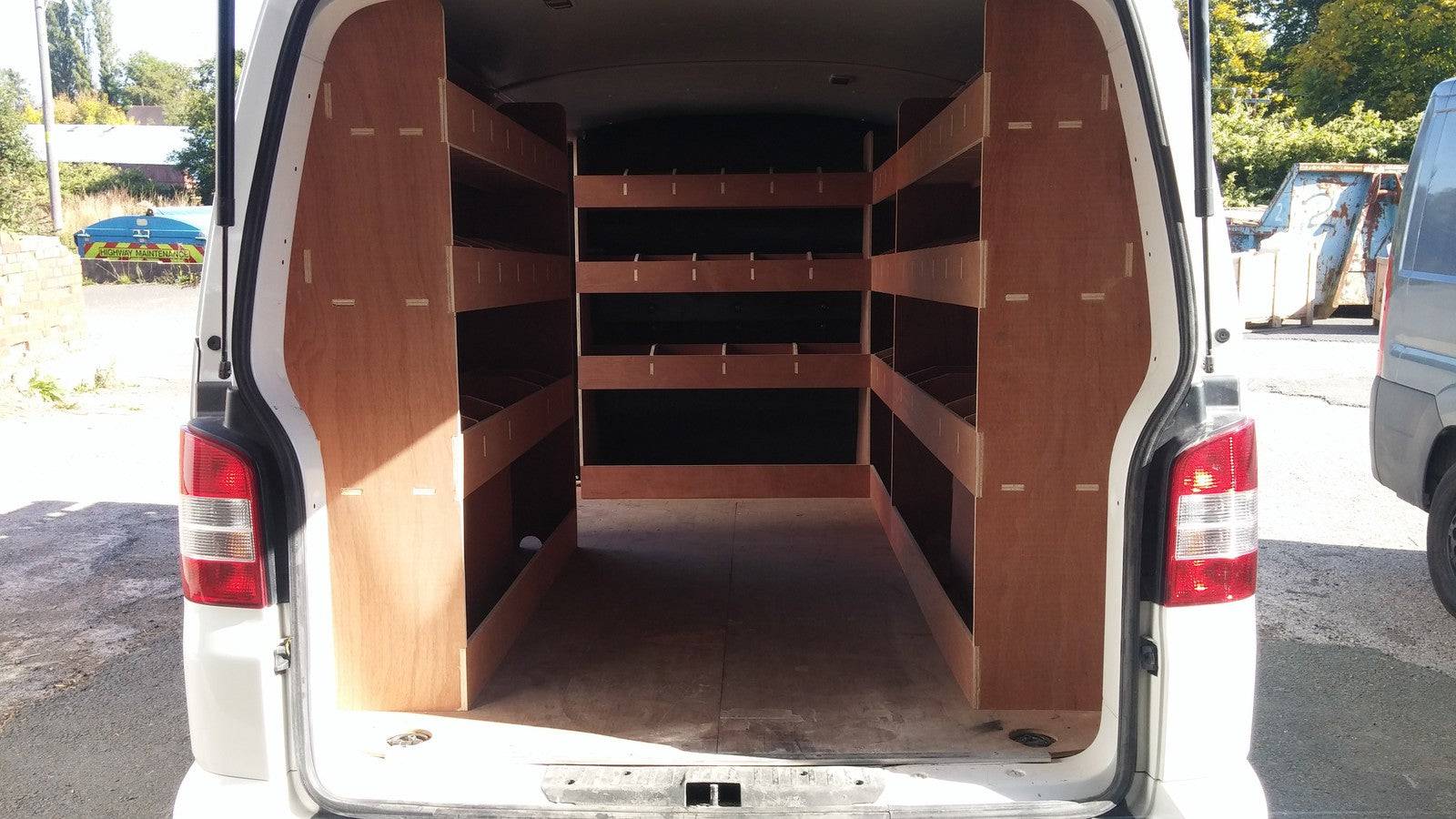 VW T6 Transporter Van Racking LWB complete plywood shelving storage system inside the vehicle for organized cargo area.