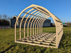 Shropshire CNC XL glamping pod frame kit showing modular building components on a construction site.