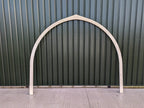 Shropshire CNC glamping pod frame arch, 3.2m modular building structure with metal arch and wooden panels for outdoor accommodation.