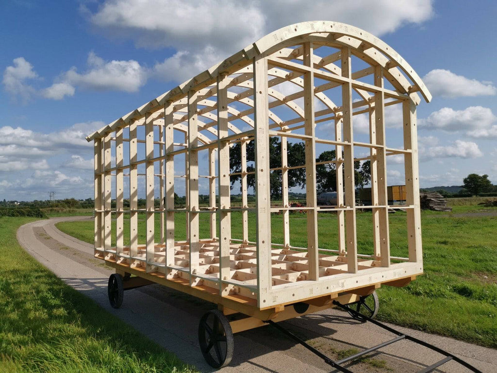 Shropshire CNC Shepherds Hut Frame Kit with metal beams and modular structure, measuring 5.4m long, 2.59m wide, and 2.668m high.