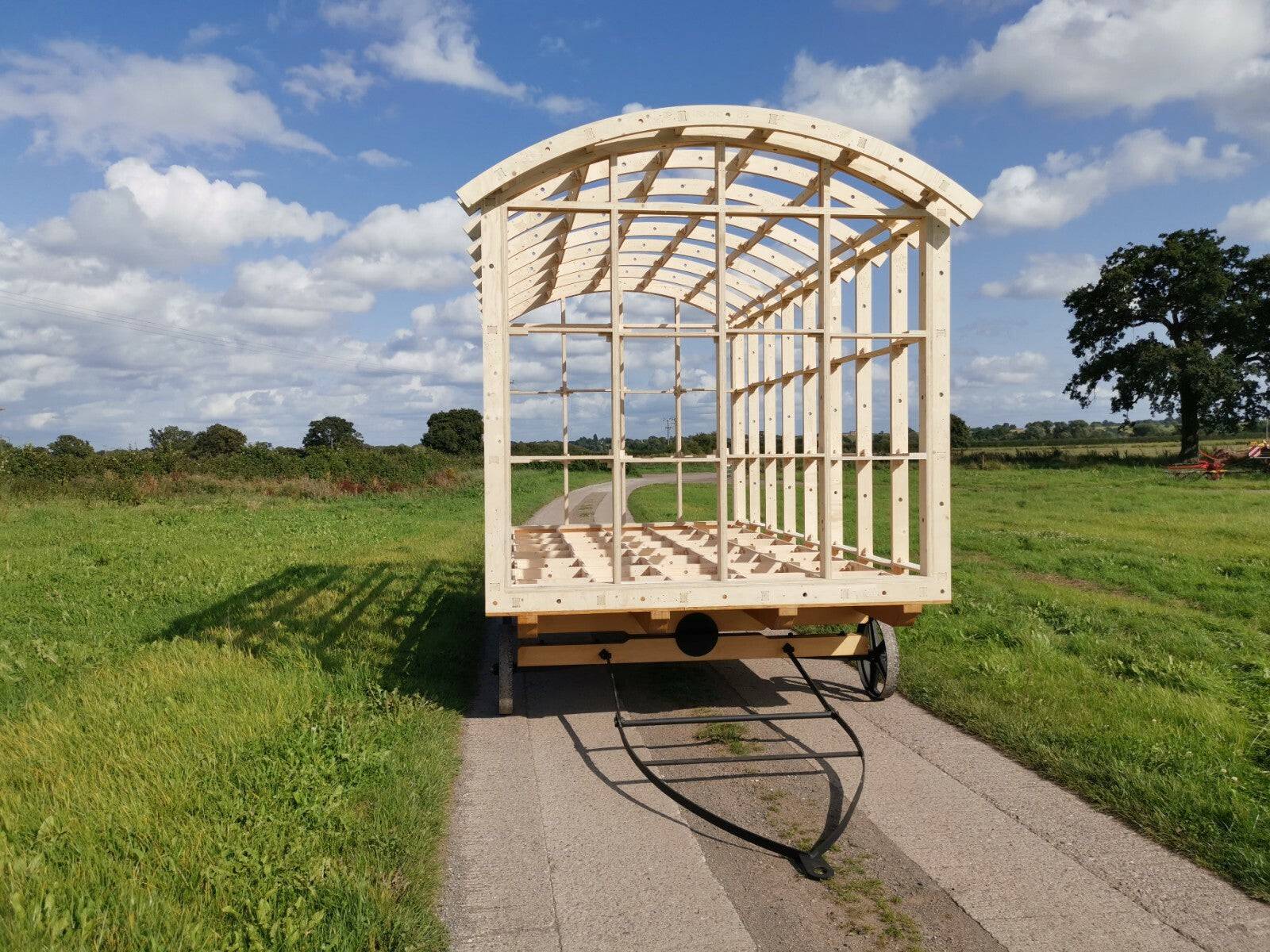 Modular Shepherds Hut frame kit by Shropshire CNC, 6m long, 2.6m wide, 2.7m high, showing assembled steel frame components.