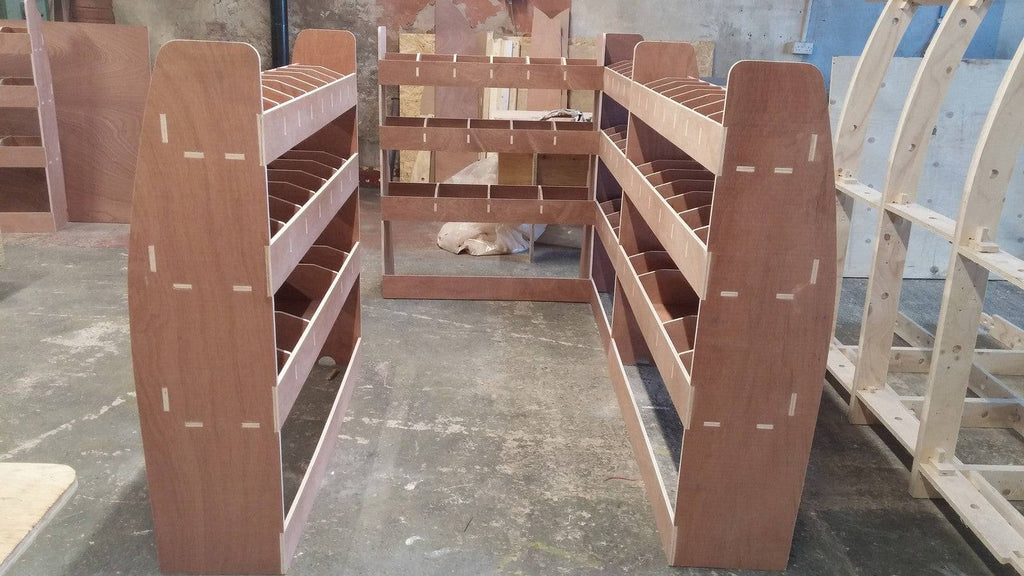 VW T6 Transporter Van racking system with plywood shelves for LWB models, providing organized storage for commercial vehicles.