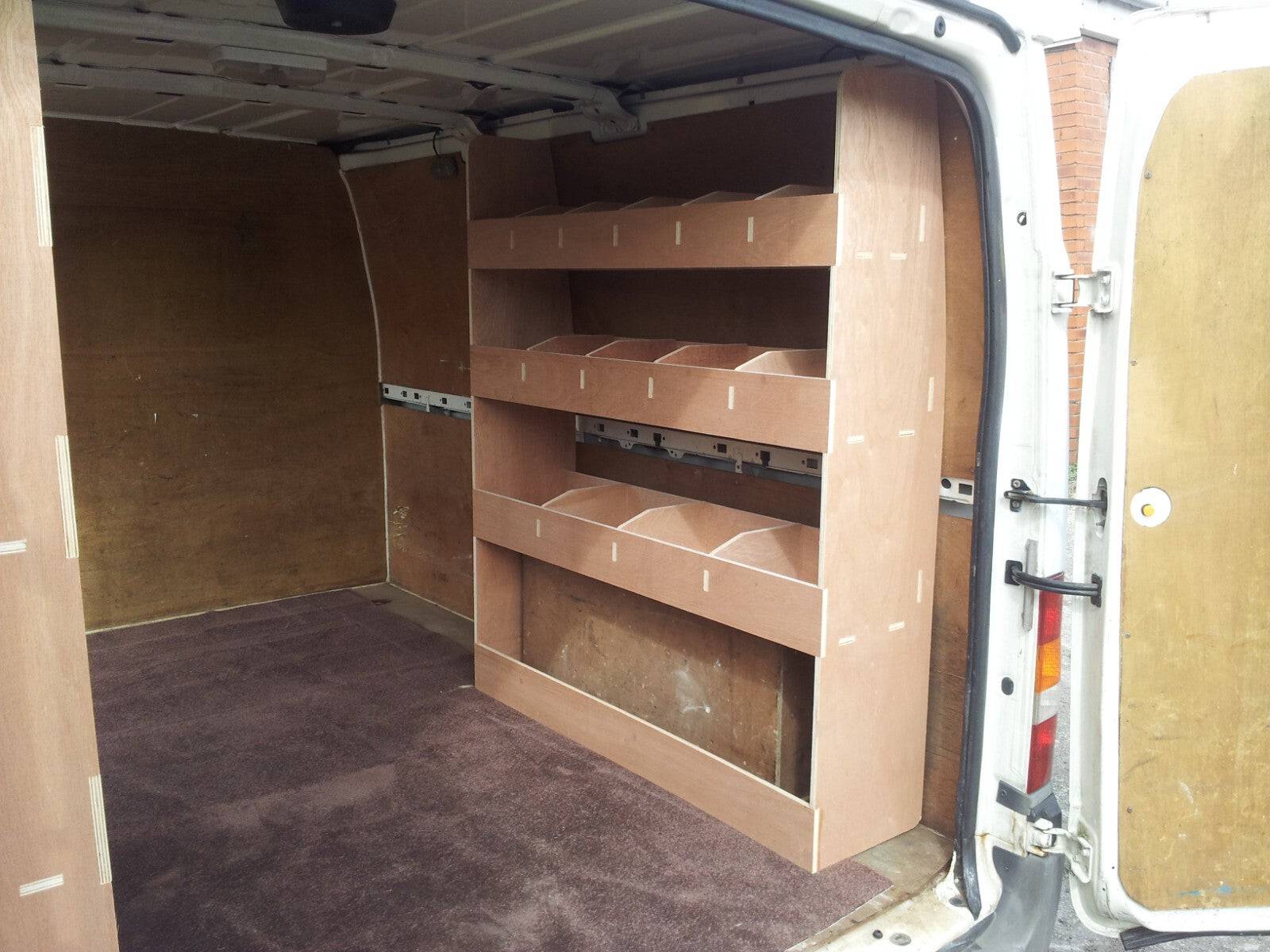 RS Ford Transit MK6 MK7 SWB van racking with plywood shelves for tool storage and organization in the cargo area.