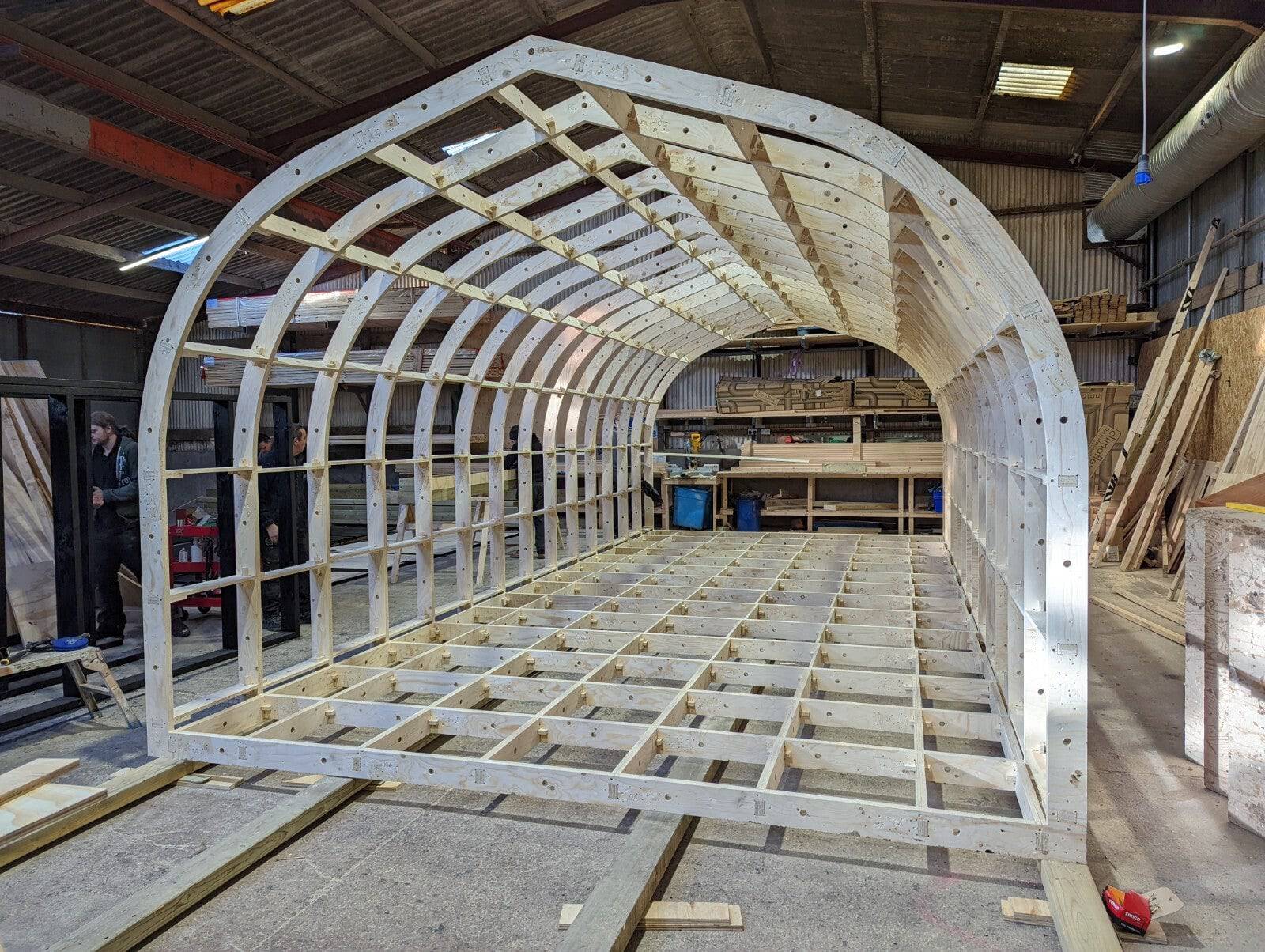 Shropshire CNC glamping pod frame kit, 4.2m wide, modular building structure with metal framework and supporting beams.