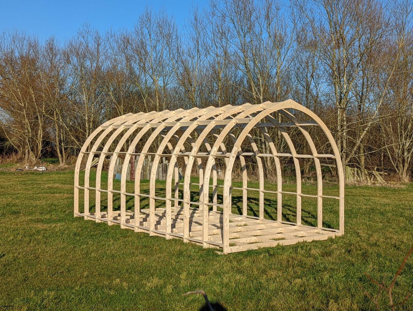 Shropshire CNC XL glamping pod frame kit with modular building components in 6.0m by 2.95m size, showing assembled steel frame structure.