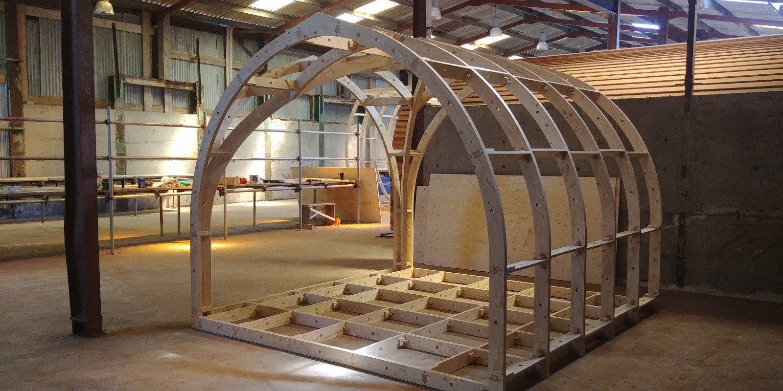 Shropshire CNC XL Center Door Pod Frame Kit for modular buildings, showing metal frame components and door opening.