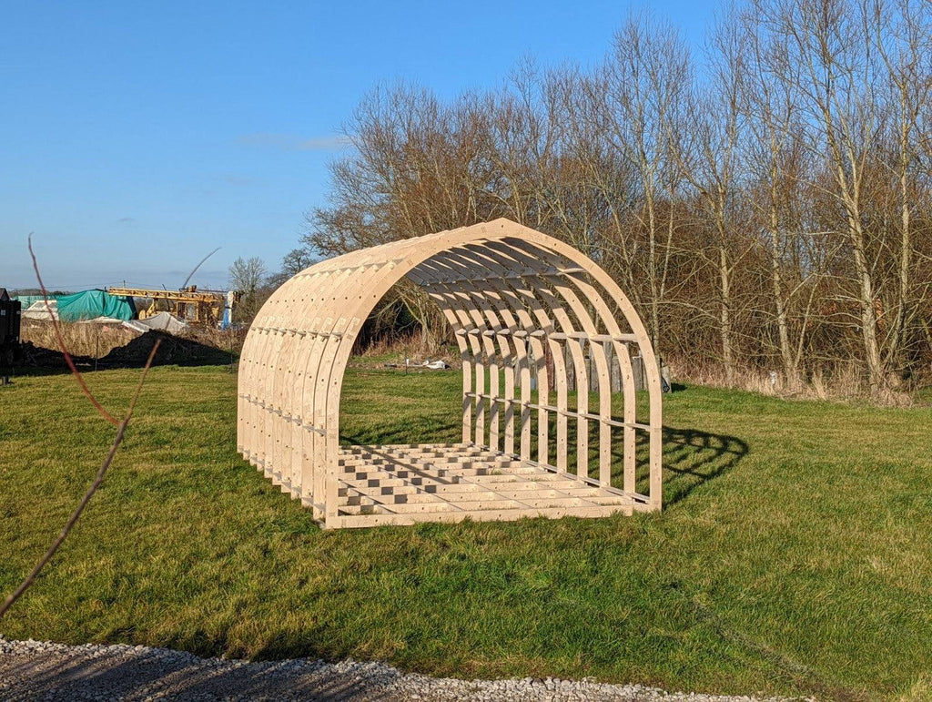 Shropshire CNC XL glamping pod frame kit with modular building components, measuring 6.0m by 2.95m, ready for assembly.