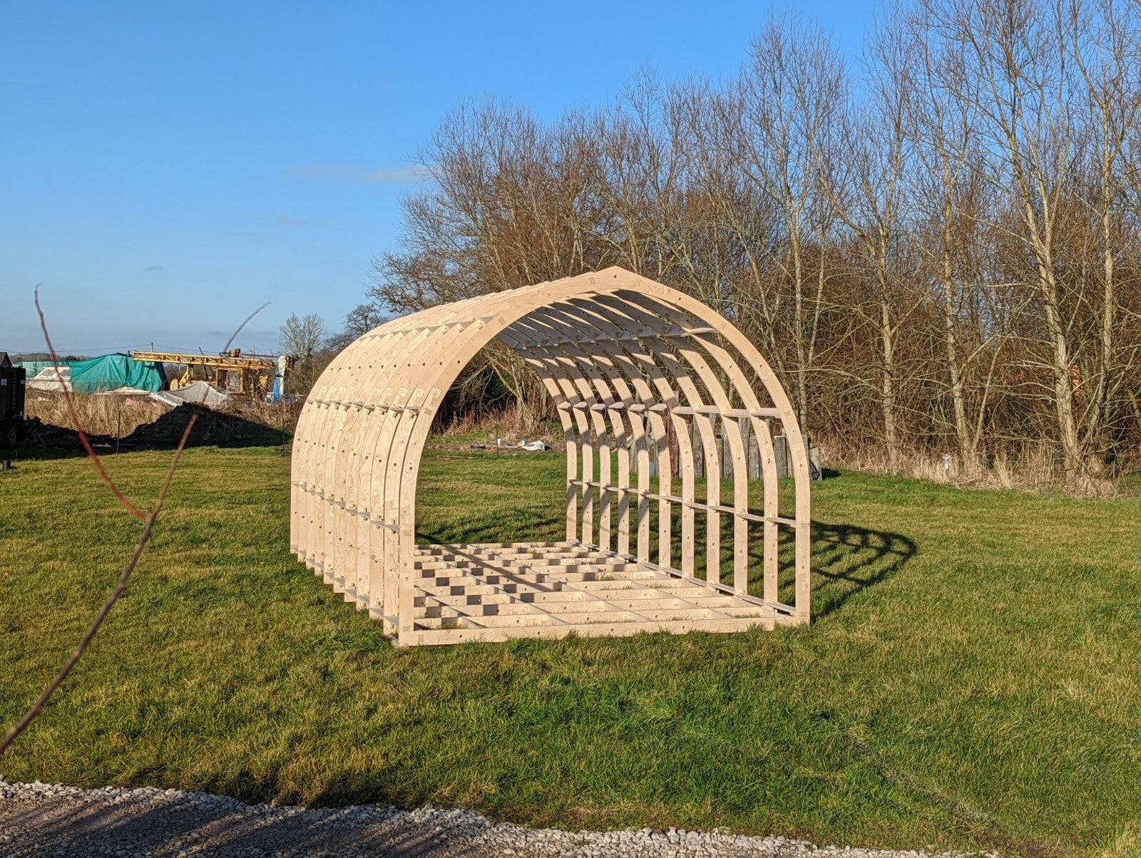 Shropshire CNC XL glamping pod frame kit with modular building components, measuring 6.0m by 2.95m, ready for assembly.