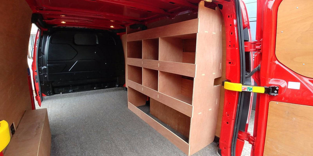 Ford Custom van plywood racking shelving with deep tool storage in a long wheelbase van, designed for commercial vehicle organization