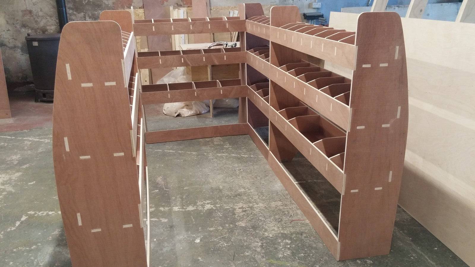 VW T6 Transporter Van Racking LWB complete shelving and storage organiser system inside a commercial vehicle.