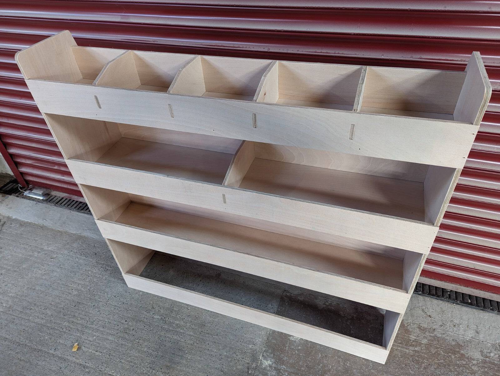 RS Ford Transit Connect 2014 van racking and shelving units installed on both near and off sides for organized vehicle storage.