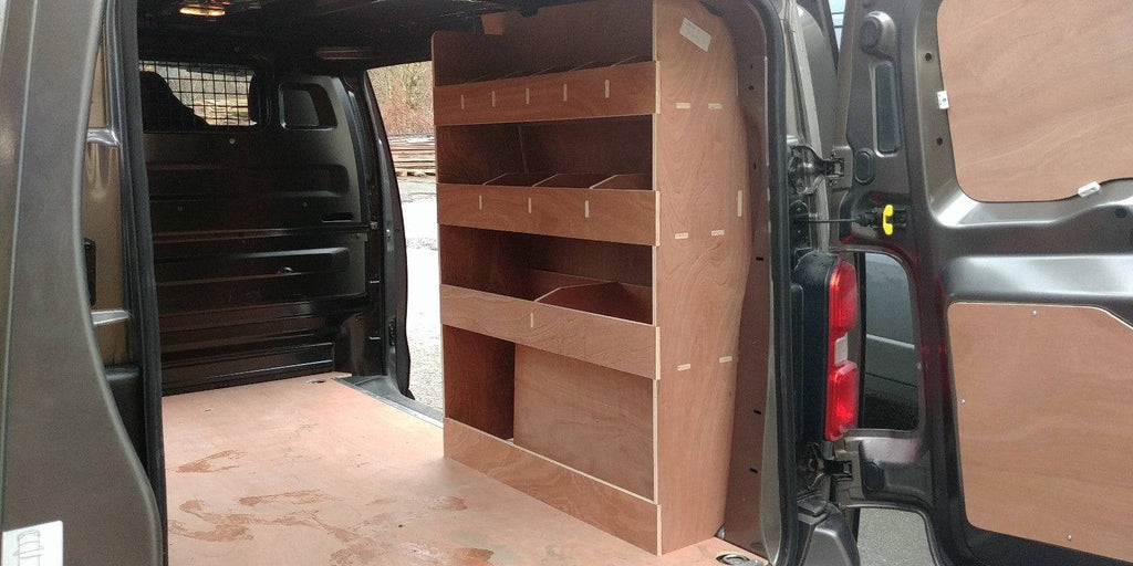 CNC Design plywood van racking and shelving installed in a Peugeot Expert MWB (2016) commercial van for organized storage.
