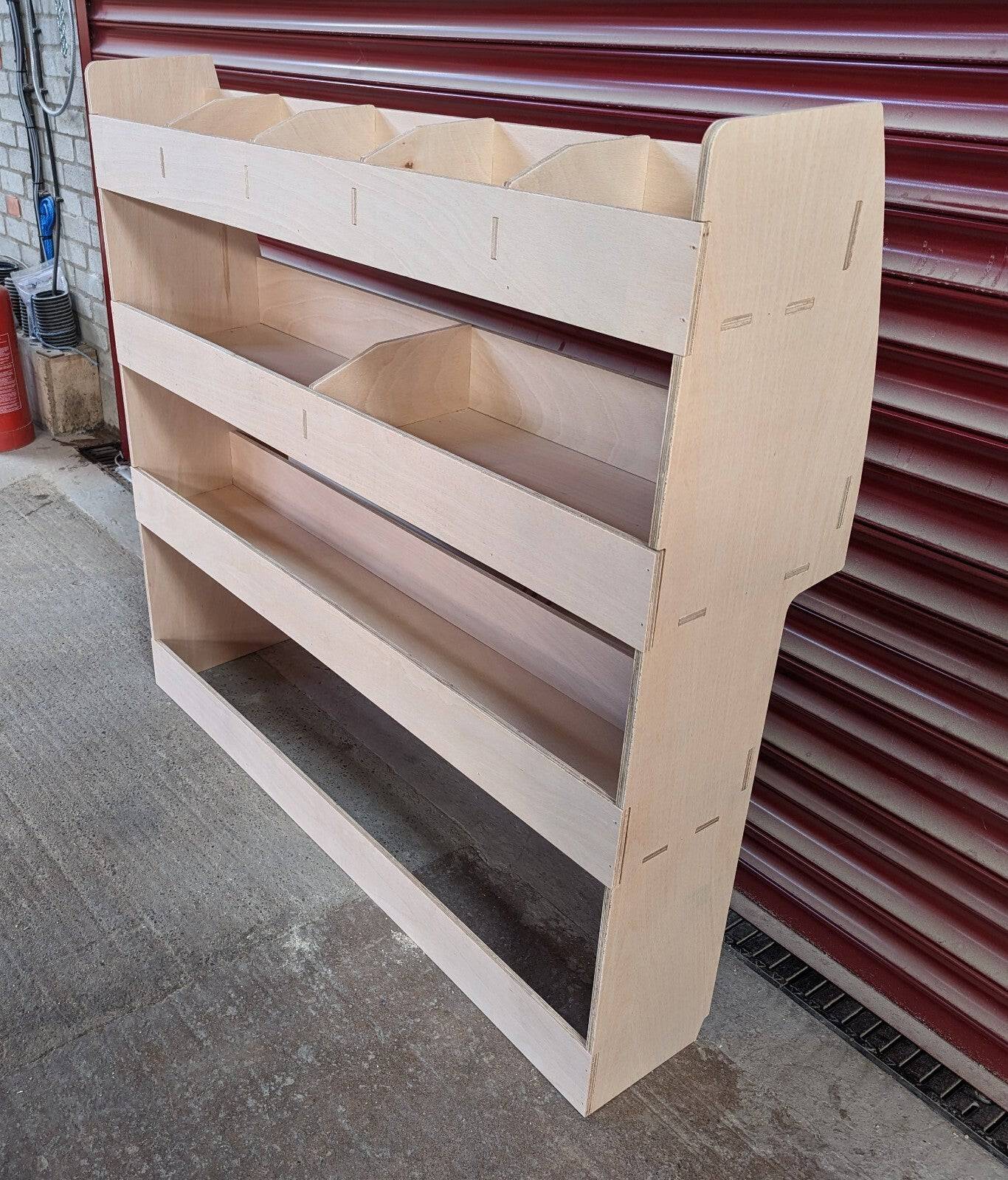 RS Ford Transit Connect 2014 van racking with side shelving, showcasing organized storage on both near and off sides of the vehicle.