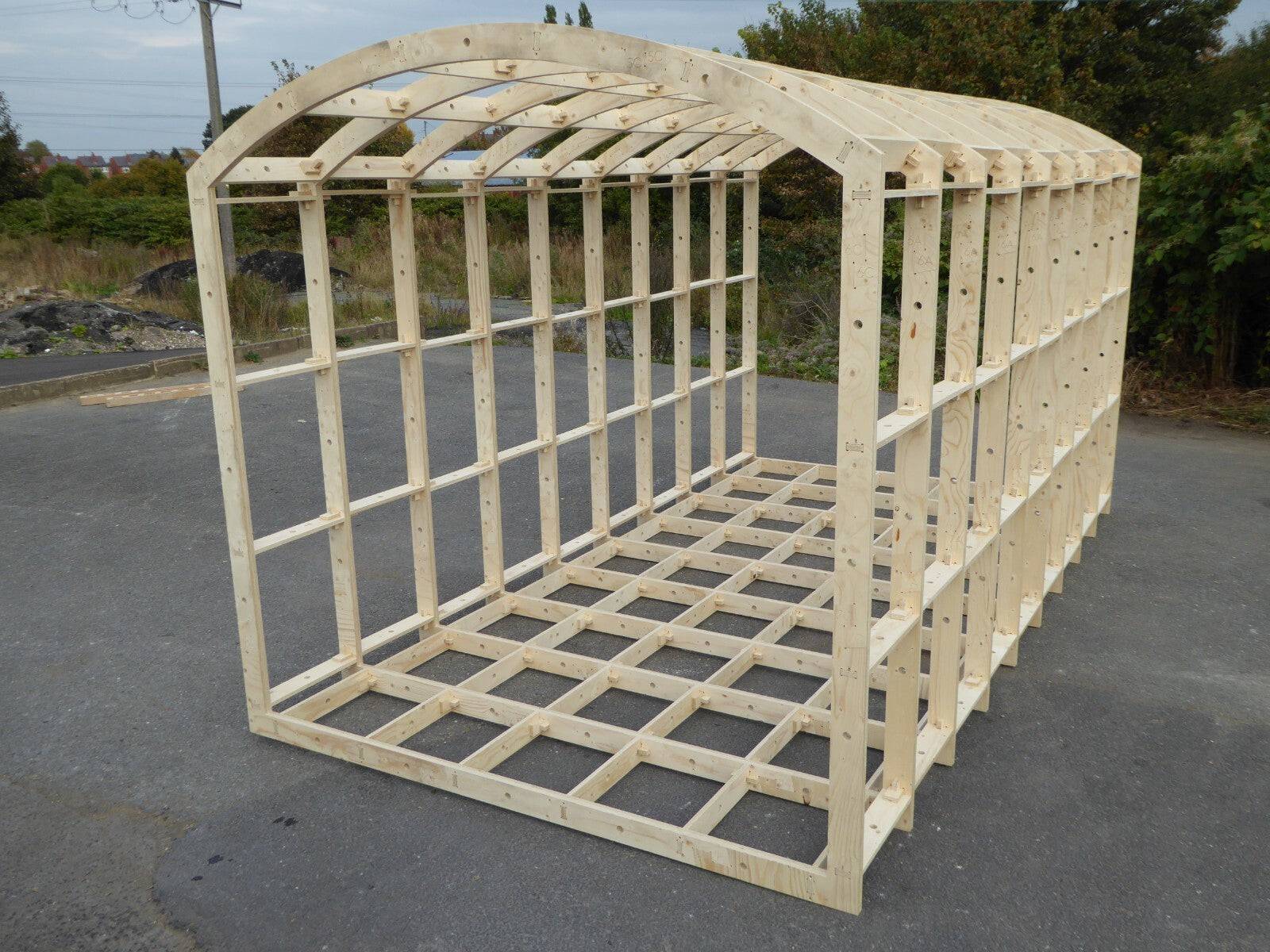 Modular shepherds hut frame kit by Shropshire CNC, 2.59m wide, showing assembled wooden frame for DIY building project.