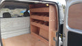 Fiat Fiorino van with plywood shelving racking for storage accessories, installed in the cargo area for organized van interior.