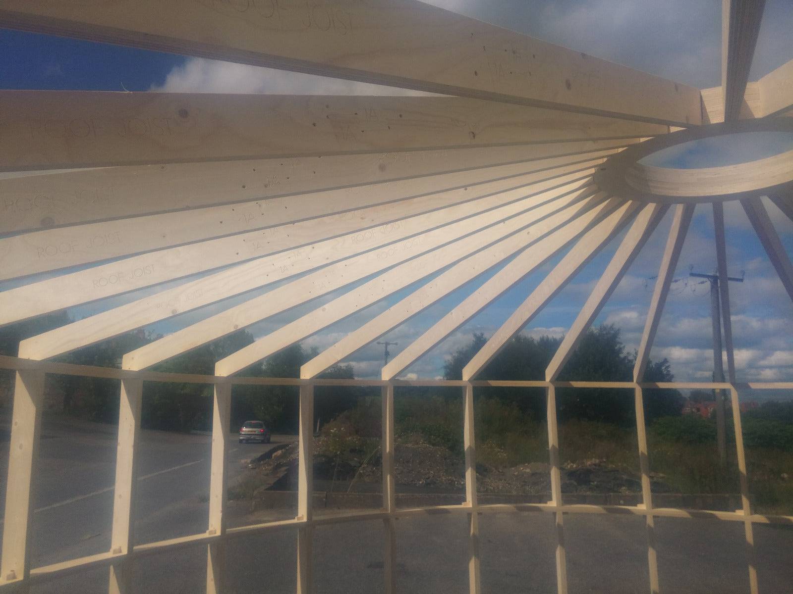 Shropshire CNC Yurt Pod Frame Kit, 4.2m modular building with wooden beams and structural components, ready for assembly