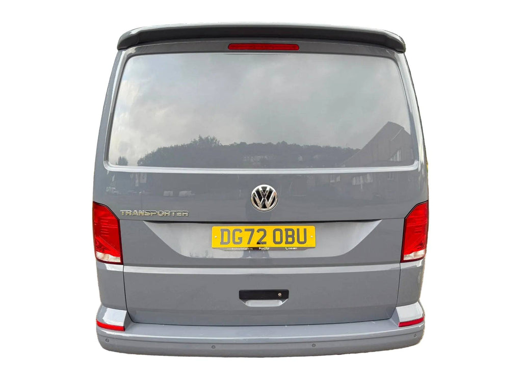 VW T5 T6 tailgate ply lining for van interior, showing textured wooden paneling on the tailgate of the vehicle.