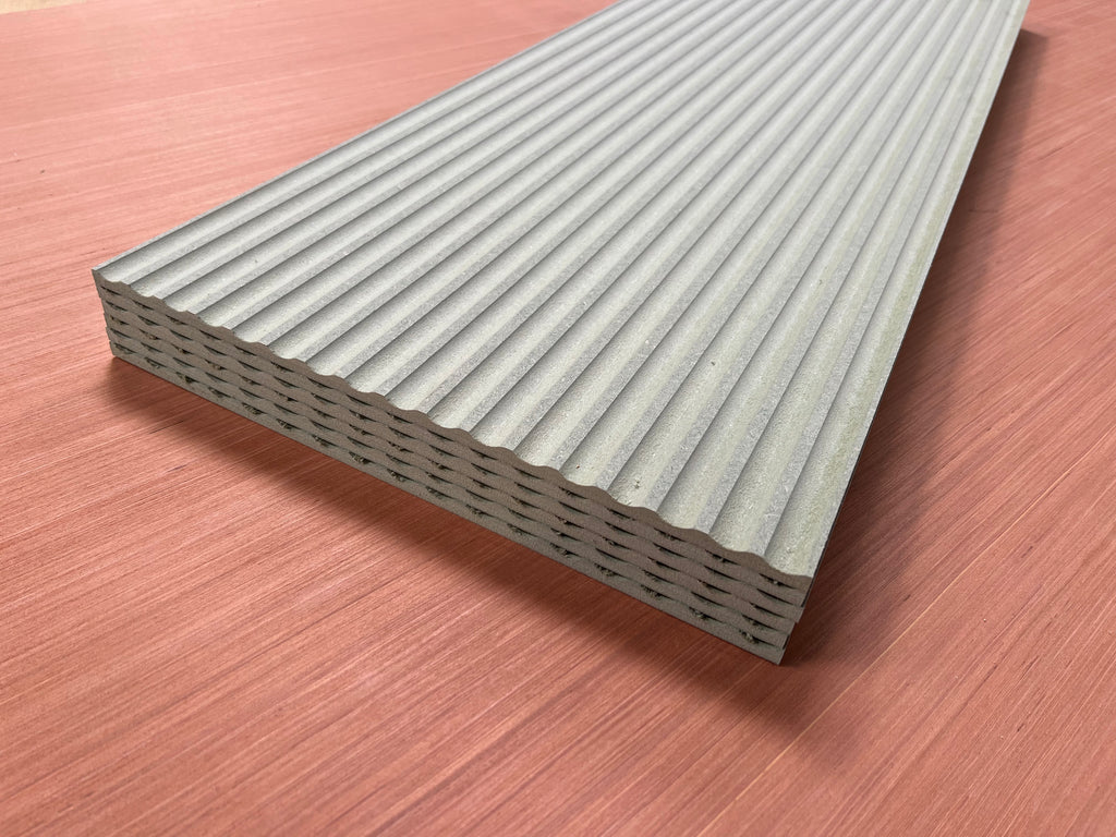 Shropshire CNC MDF 9mm fluted wall panel kit with multiple textured gray panels arranged in a modern interior setting