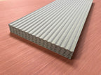 Shropshire CNC MDF 9mm fluted wall panel kit with multiple textured gray panels arranged in a modern interior setting