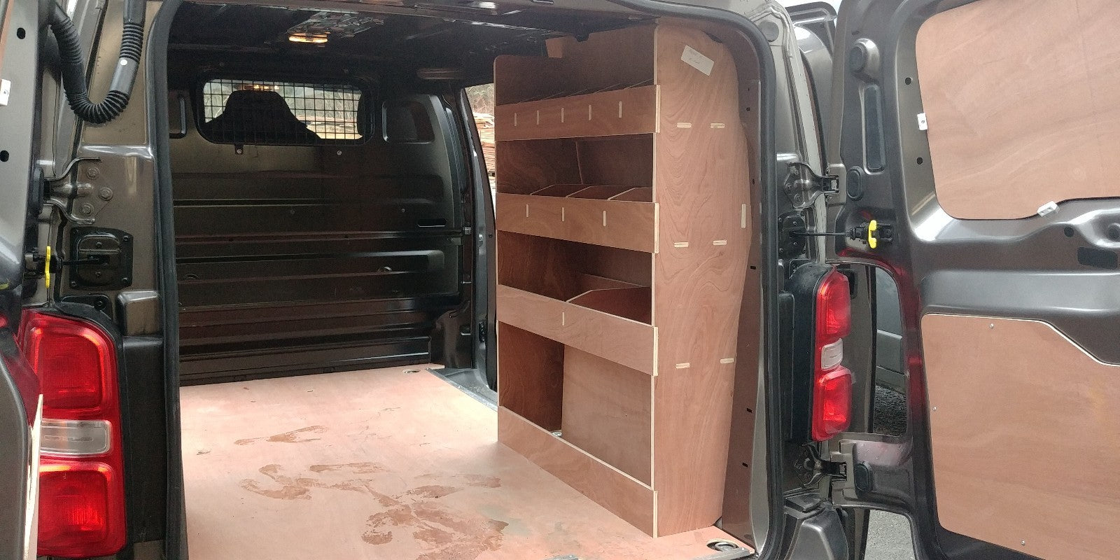 CNC Design Citroen Dispatch MWB 2016 van racking with plywood shelving for vehicle storage and organization.