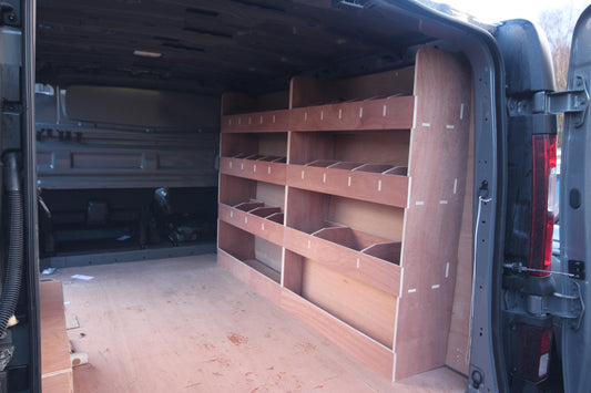 Fiat Talento SWB van with double unit plywood shelving racking for tool organization in the cargo area.