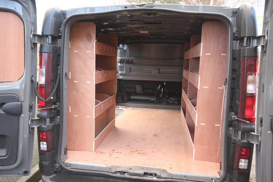 Fiat Talento SWB van with triple plywood shelving unit for van racking and tool organization in the cargo area.