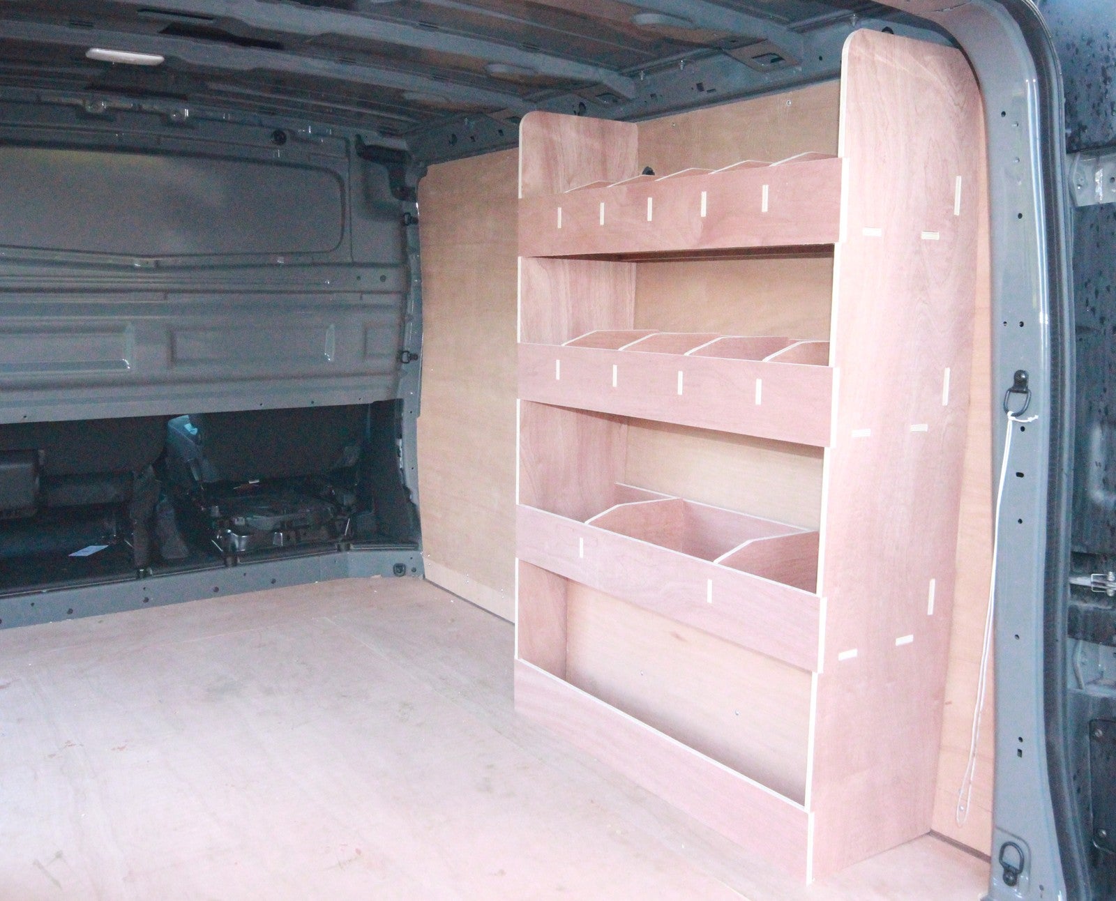 Fiat Talento SWB Van with plywood shelving and tool organizer for efficient van racking and storage.