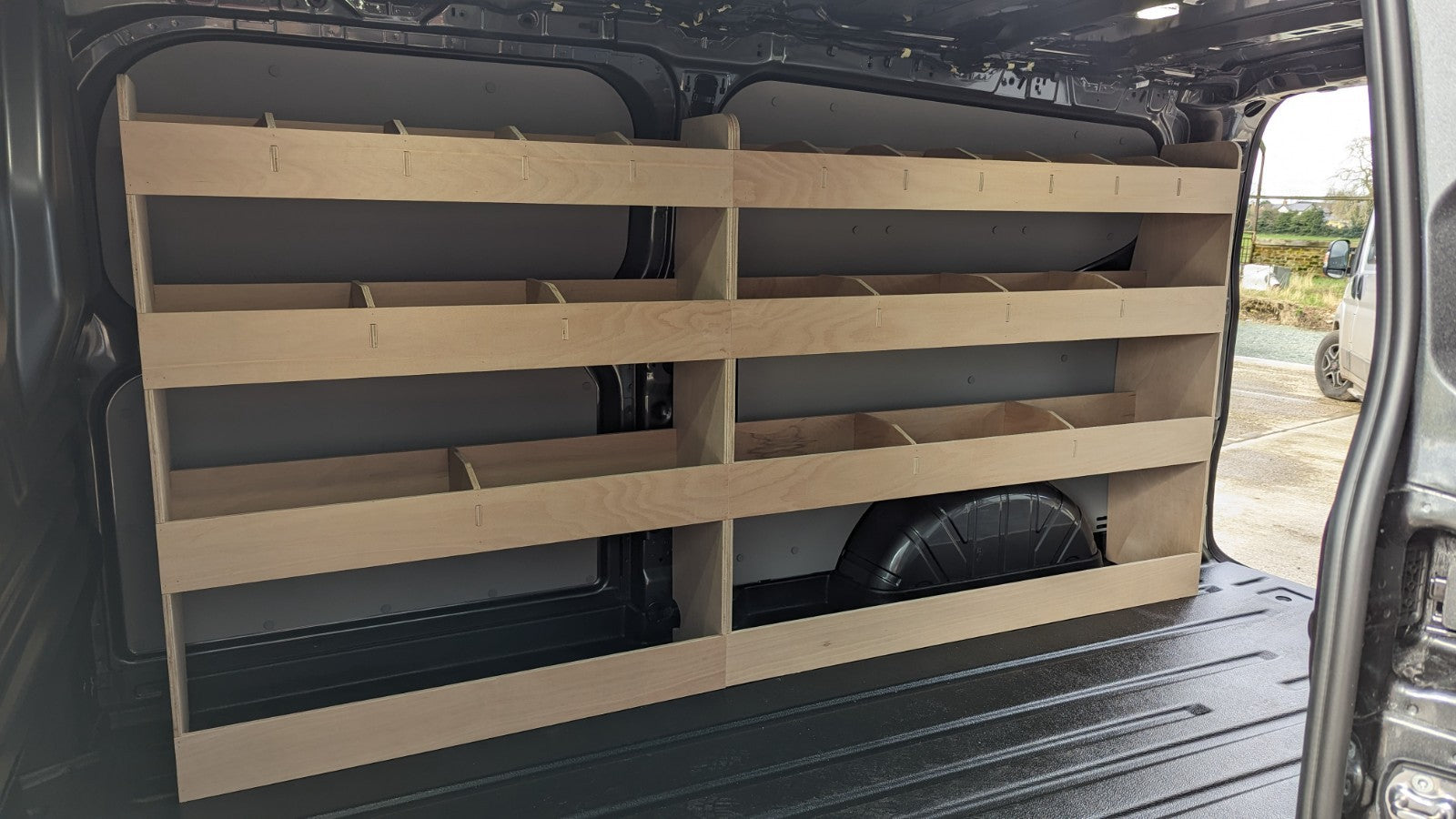 Ford Transit Custom 2024 LWB van racking with double shelving system, installed inside the cargo area for organized storage.