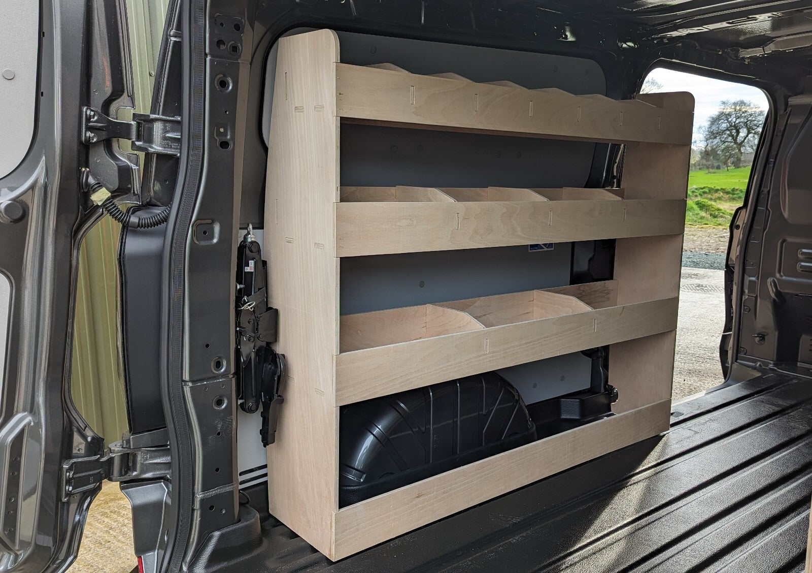 Ford Transit Custom 2024 LWB van racking system with tool organiser, designed for efficient commercial vehicle storage.