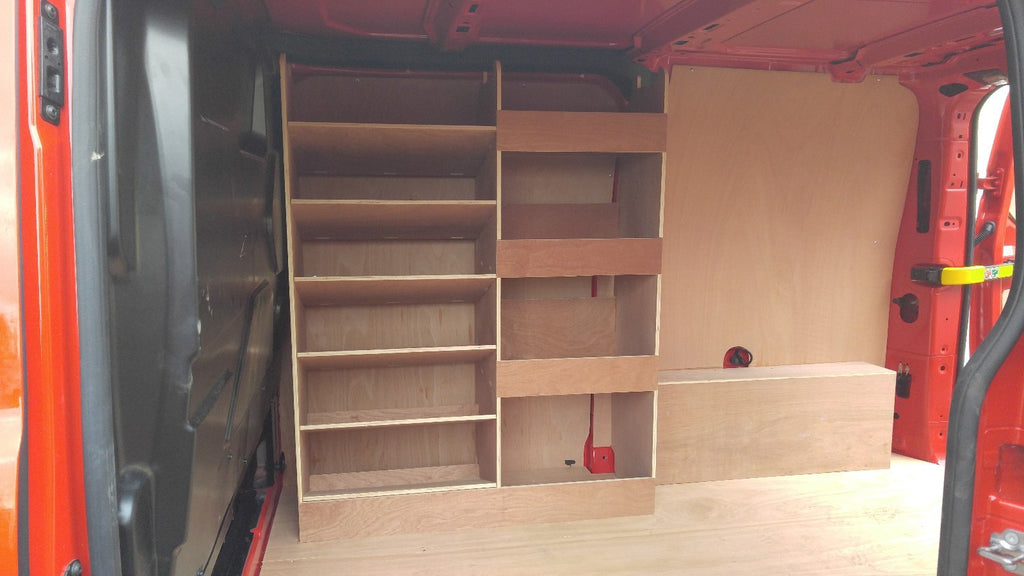 Ford Custom van racking with plywood shelving and deep storage drill/service case for commercial van organization.