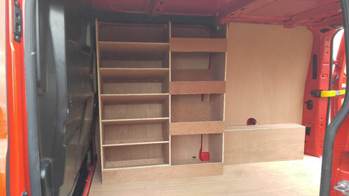 Ford Custom van racking with plywood shelving and deep storage drill/service case for commercial van organization.