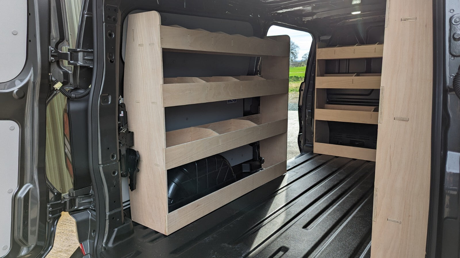 Full set of four plywood van side panels for Ford Transit Custom LWB 2024 commercial vehicle, durable and ready for installation.