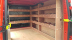 Ford Transit Custom van racking with triple shelving for organized storage of tools and equipment in commercial vehicle.