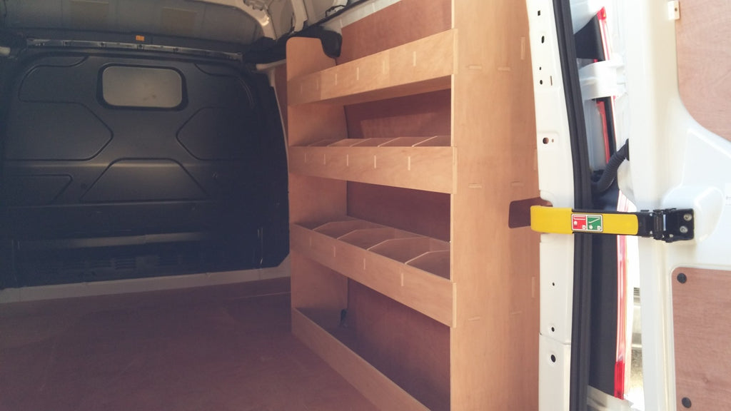 Ford Custom LWB Van racking with plywood shelving, storage accessories, and tools for commercial vehicle organization.