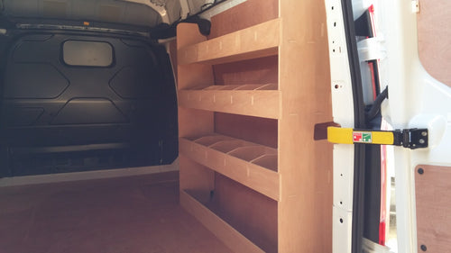 Ford Custom LWB Van racking with plywood shelving, storage accessories, and tools for commercial vehicle organization.