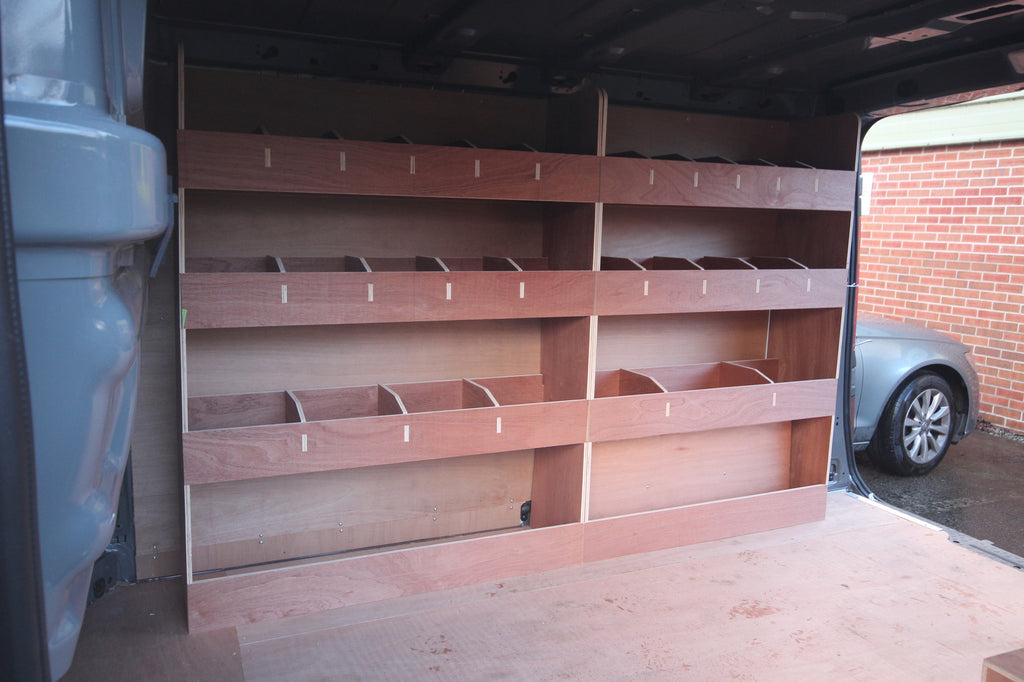 Nissan NV300 SWB 2015 van with double unit plywood shelving rack for commercial vehicle storage and organization.