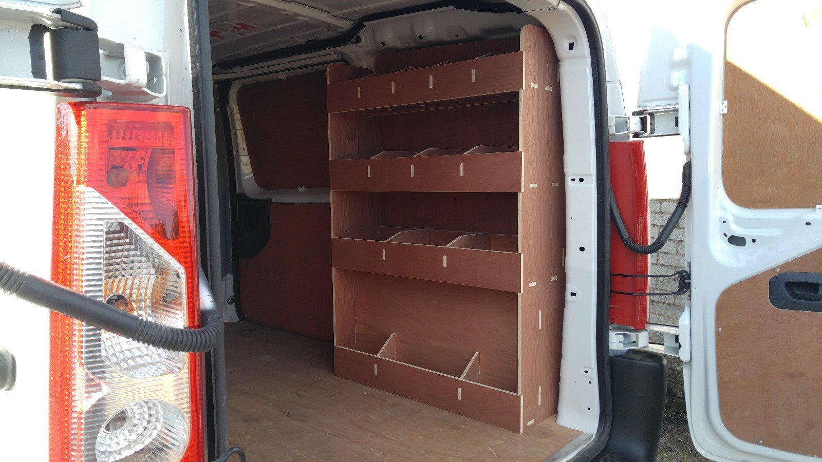 PEUGEOT EXPERT van racking with plywood shelving for storage, designed for 2007 onwards Peugeot Expert commercial vehicles.