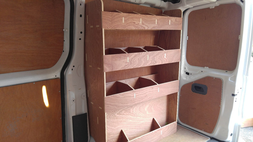 PEUGEOT EXPERT 2007+ van racking with plywood shelving for organized van storage and commercial vehicle parts.