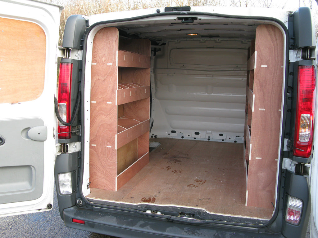 Renault Trafic SWB Van 2008-2013 with plywood shelving and storage racking for tools and cargo organization.