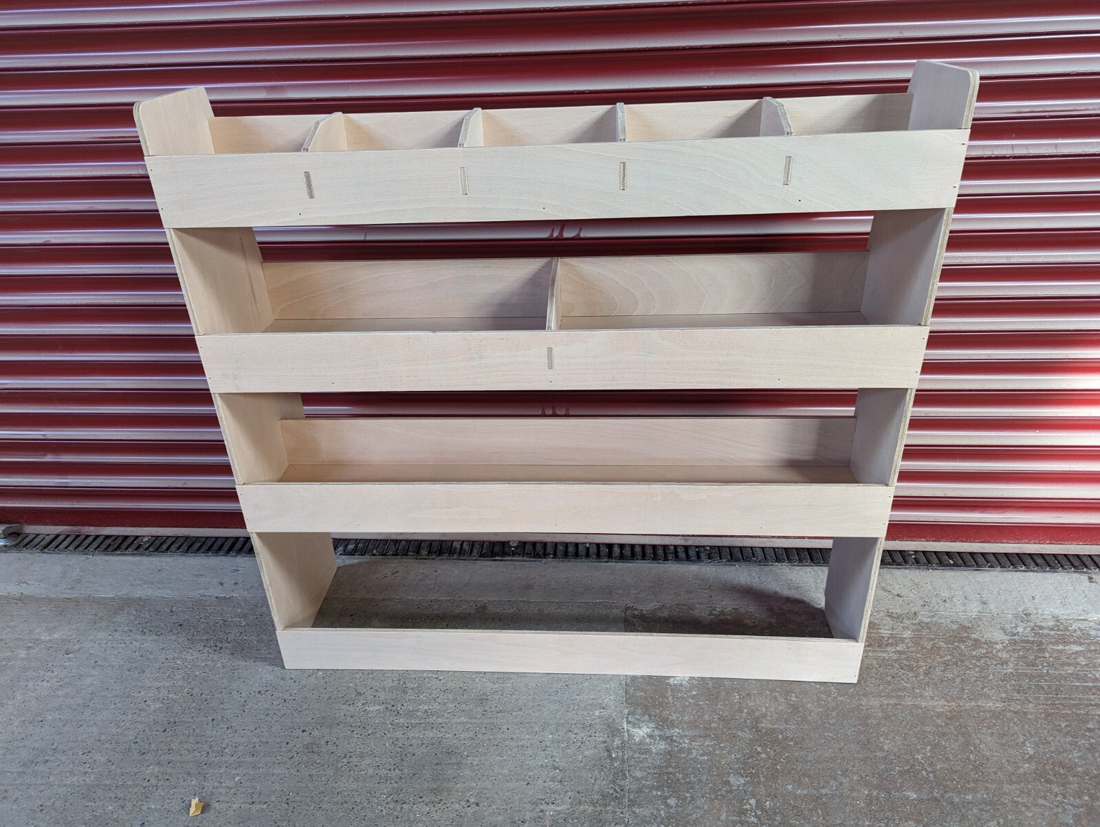 RS Ford Transit Connect van racking and storage shelving on driver side, designed for 2014 model commercial vehicle organization.