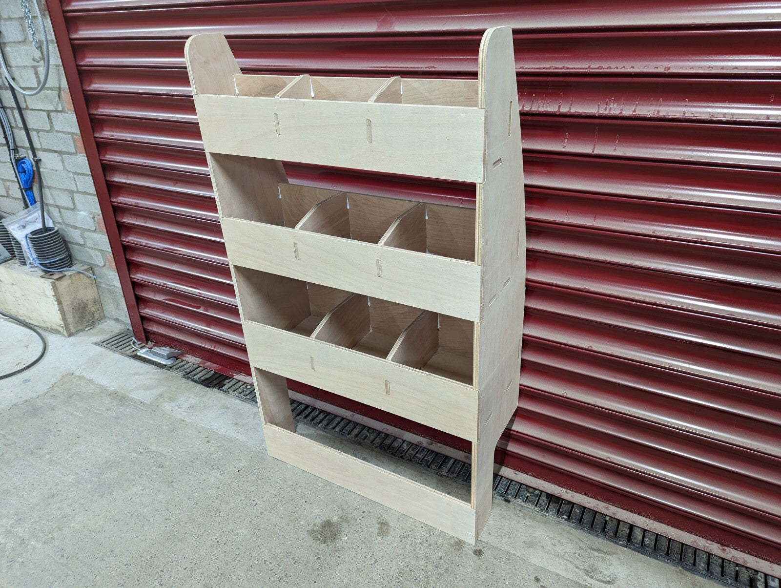 RS VW Caddy SWB van racking and shelving organizer on near side, designed for tool storage and vehicle organization.